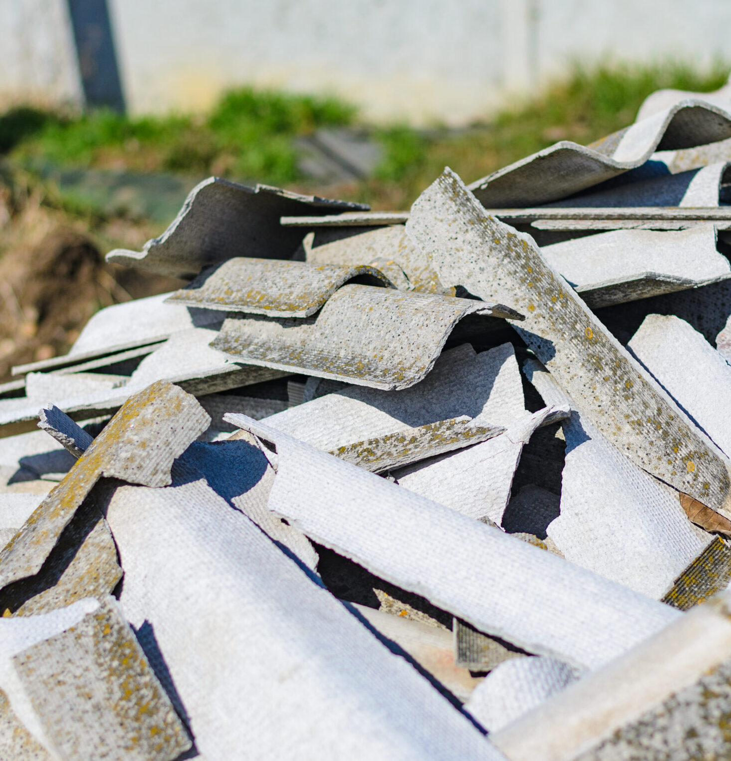 Broken asbestos roof, asbestos removal